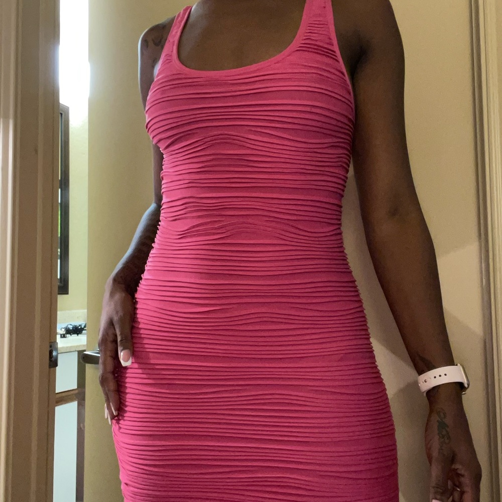 Form fitting neon pink dress